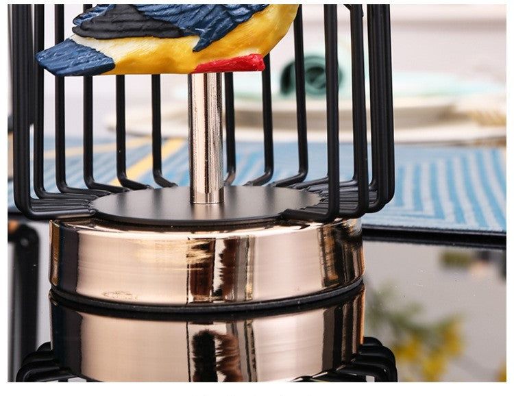 Showpiece Featuring a Bird inside a Metal Frame for Home Decor