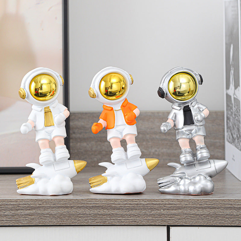 Astronaut On Rocket Figurine
