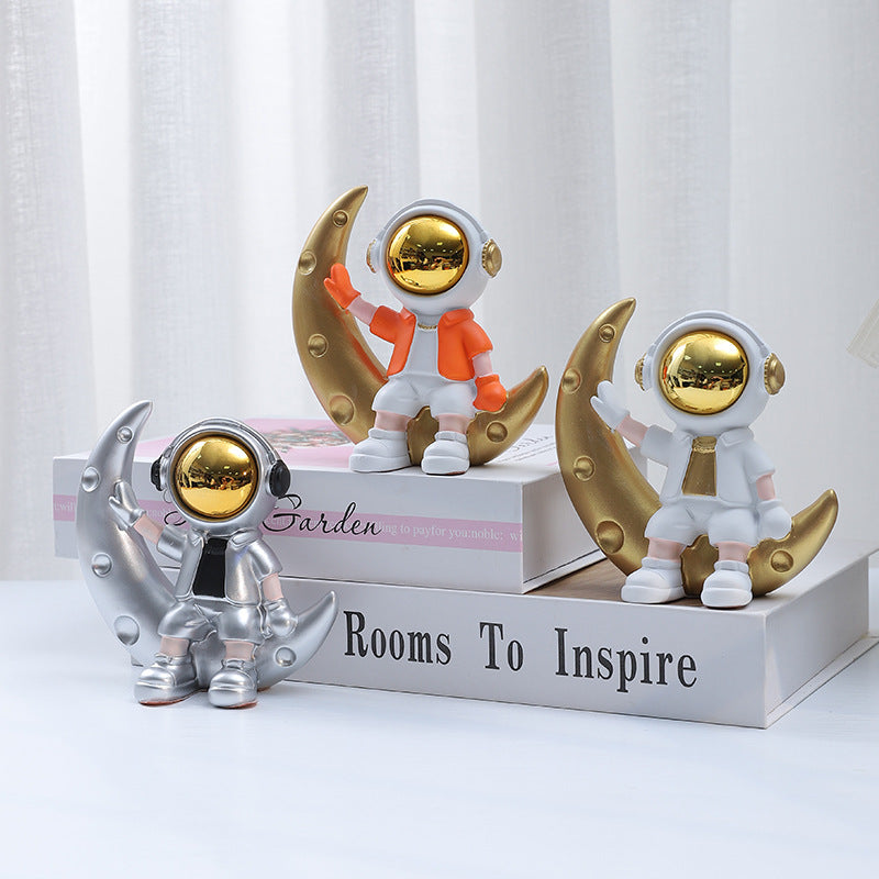 Astro Sitting on Moon Figurine