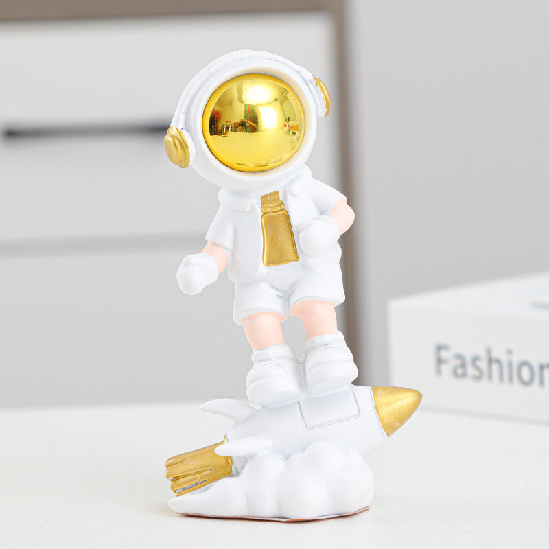 Astronaut On Rocket Figurine