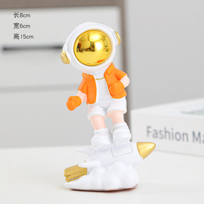 Astronaut On Rocket Figurine