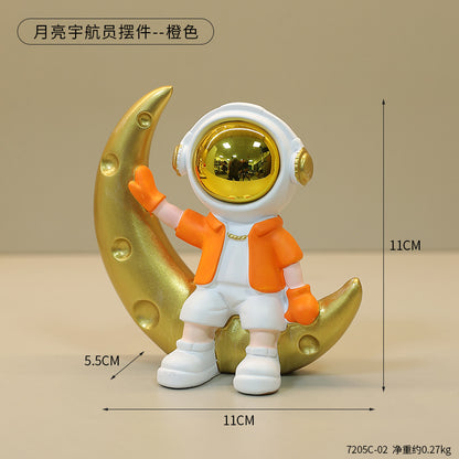 Astro Sitting on Moon Figurine